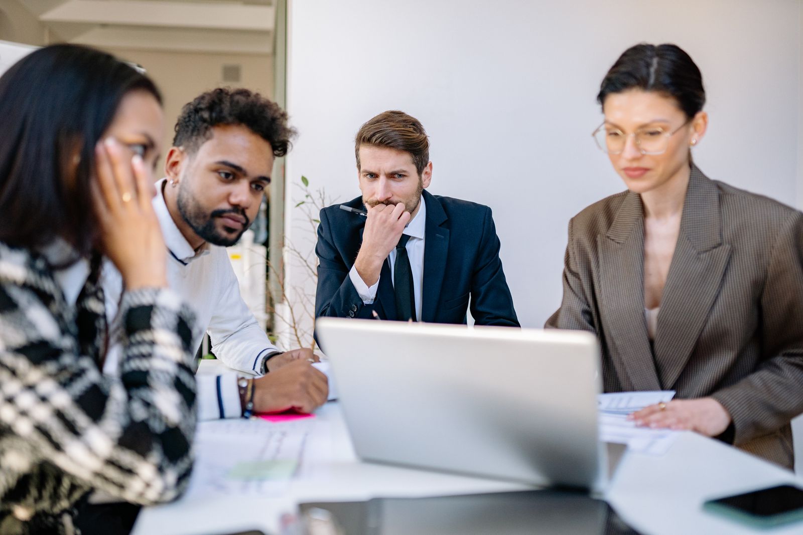 A small team working through a question together
